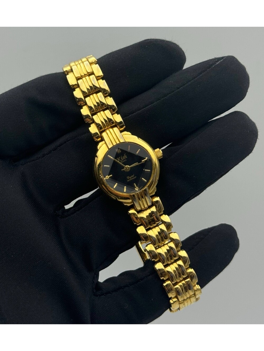 Kish Black Face Gold Case Gold Tone Bracelet Strap New Battery CZ stone 0.05CT